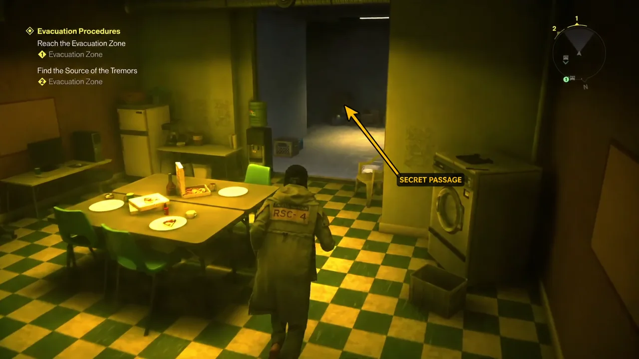 The opened passage at the back of the break room, arrow added